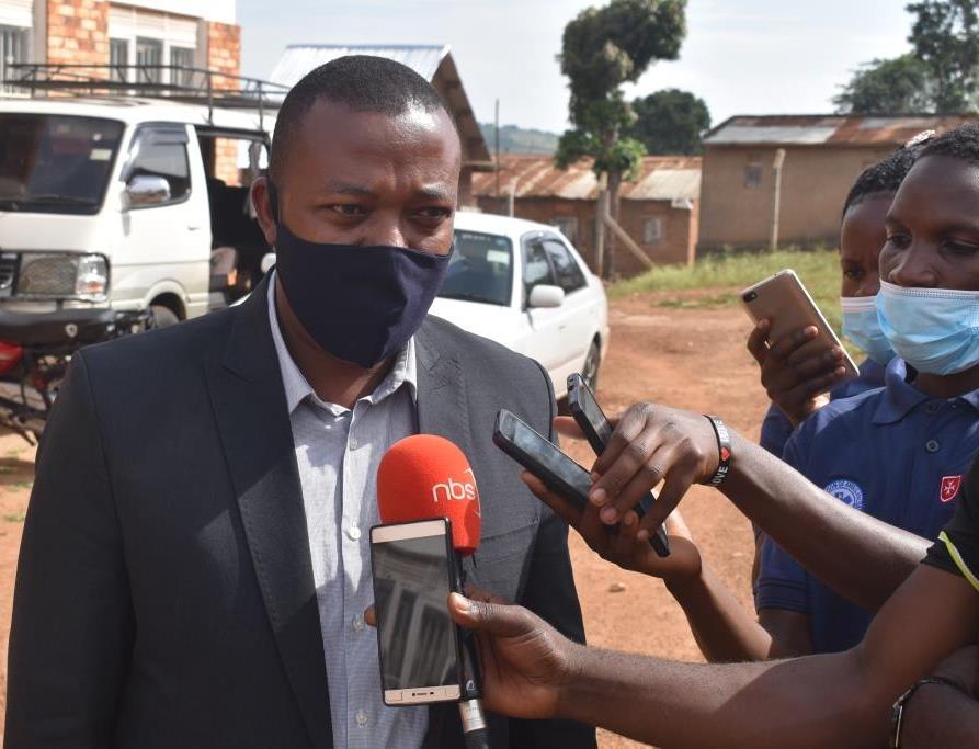 Dr. Moses Kafumbe, the Lwengo District Health Officer, speaking to reporters about the Covid19 situation. Photo by Davis Buyondo