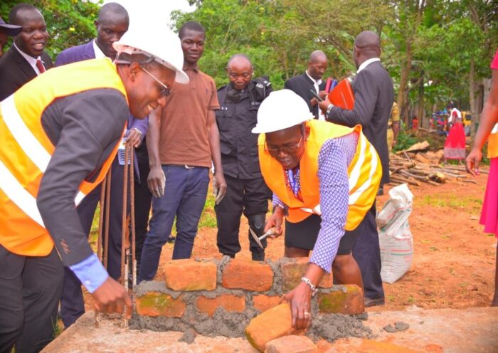 Abodo right commissions the construction of the rehabilitation centre left is Mr Pater Sewakiryango loking on