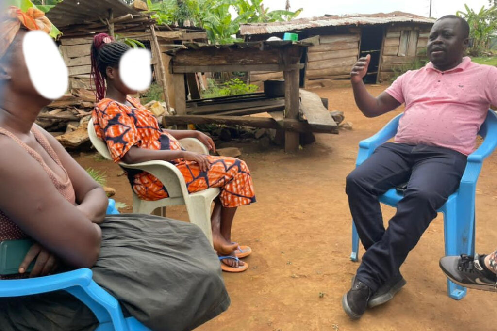 Ken-Nangai-R-from-Katalemwa-Cheshire-Home-working-together-with-Philomera-Hope-Foundation-counselling-Jane-plaited-hair-and-the-mother-on-what-to-do-to-avoid-sexual-buse-and-unwanted-pregnancies.