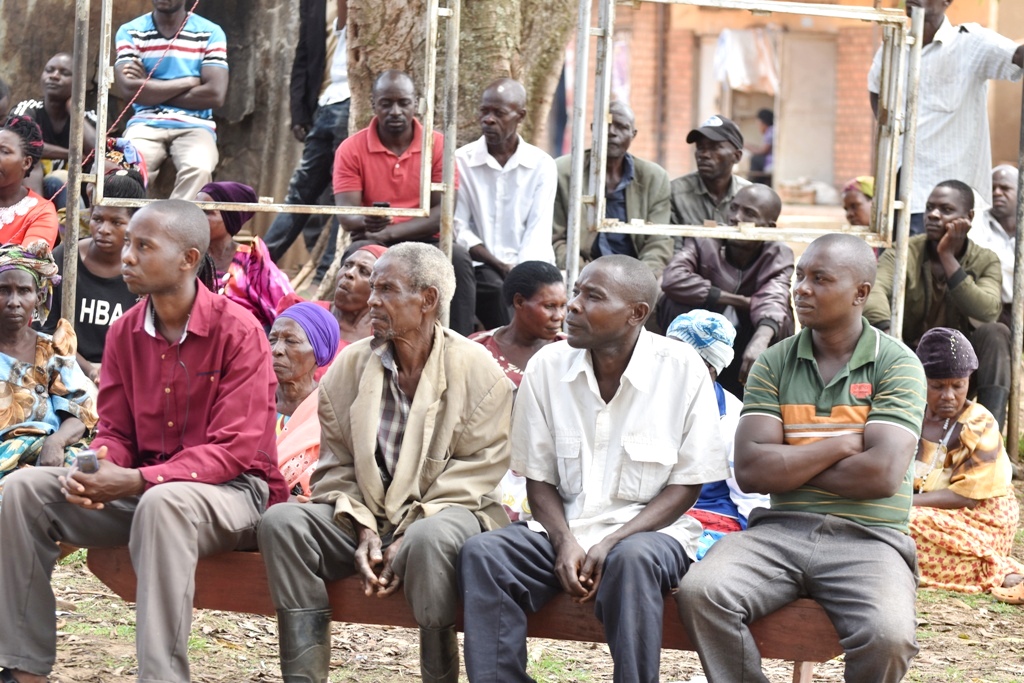 Affected tenats in a community meeting at Kijumba-Bulyakamu village on Friday. Photoby DavisBUyondo