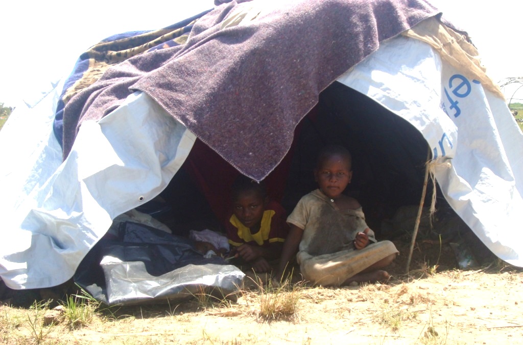 Children shelter in the tent at sango bay in 2013