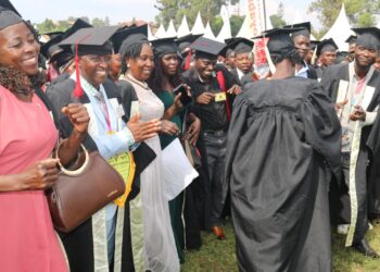 Some of the people who were awarded with certificates celebrated at Mukono boarding primary school.