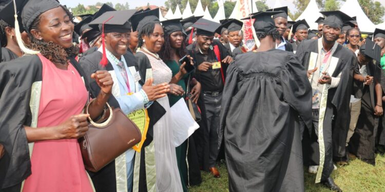 Some of the people who were awarded with certificates celebrated at Mukono boarding primary school.