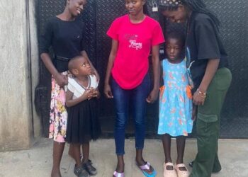 Cynthia Precious Ayo (Red) scored 16 points from HEL/CST at St. Mark's College Namagoma. Besides, are siblings celebrating her victory.