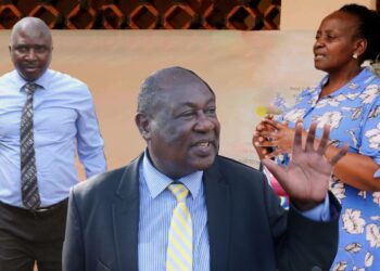Robert Mbaziira, Mukono District Land Officer, Minister Sam Mayanja and Mukono CAO, Elizabeth Namanda.