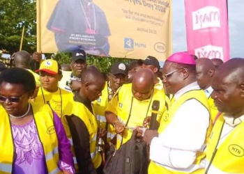 His Grace Raphael p’Mony Wokorach, the Diocesan Administrator of Nebbi Catholic Diocese flagging off foot pilgrims this morning