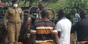 Police headed by DPC Kamukama arresting CN Sugar workers