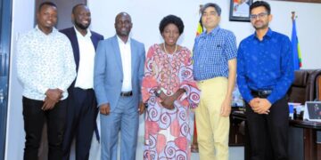 Namayingo district leaders and CN sugar investors posing for a photo with the First Deputy Prime Minister, Rebecca Kadaga.