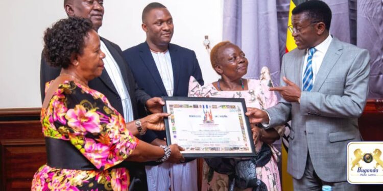 Katikiro and the Late Tamale Mirundi's family members