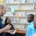 Us Ambassador HE William W Popp and the CDC Country Director Dr Mary Adetinuke Boyd during the official visit to Masaka Region interacting with the proprietors of K Frank Pharmacy one or the Pharmacies under the pharmacy community models