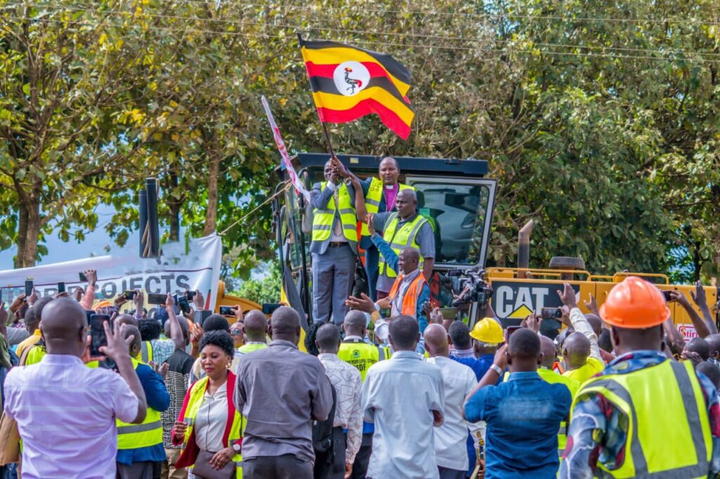 State Minister for Kampala, Kabuye Kyofatogabye together with religious leaders flagging of road construction in Mukono