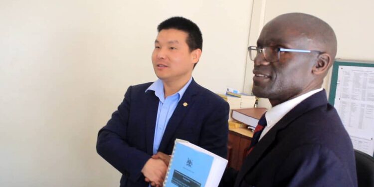 CCCC head together with the Mukono town clerk after signing contracts.