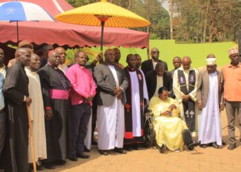 Kooki cultural head, officials and religious leaders posing for a photo after prayers.