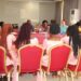 A round table discussion with the different government officials and the young mothers.