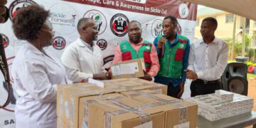 Sarafina Sickle Cell Society delegation hands over a donation of hydroxyurea drugs to the Sickle Cell Clinic at Mukono General Hospital. File photo.