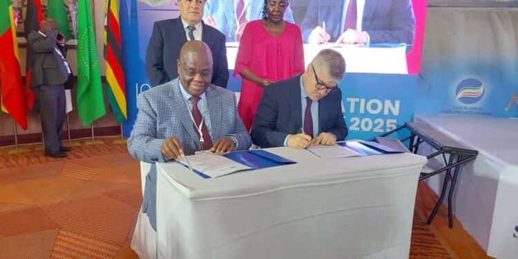 UCAA Director General Fred K. Bamwesigye signing a management service agreement with ICAO Secretary General Juan Carlos Salazar.