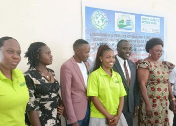 Masaka Mayor and environmentalists pose for a photo after the inaugural consultative meeting on the formulation of a by-law to regulate polythene bag use.