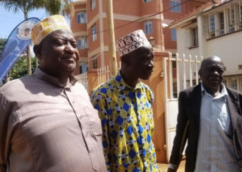 Mr. Ibrahim Walibonaki(in African print shirt) address the media after losing compensation claim.