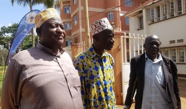 Mr. Ibrahim Walibonaki(in African print shirt) address the media after losing compensation claim.