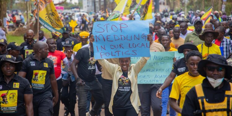 PLU sporters demonstrating against presence of Germany Ambassador.