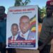Voters in Nakifuma County carrying a poster for the incumbent Member of Parliament. Courtesy Photo.