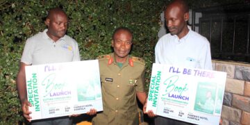 Brig. Gen. Kiyengo (center) posing for the photo with the members of Nakifuma Rotary Club who promised to attend his book launch.