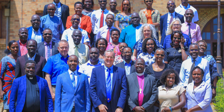 Dr Philip Ryken, President of Wheaton College in Illinois, USA posing for a photo with UCU Vice Chancellor, Chairperson of the UCU Council and other scholars.