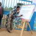 Minister Ssekindi appends her signature during comissionig of SCIF water project at Mukoko PS in Kalungu district on July 24,2025
