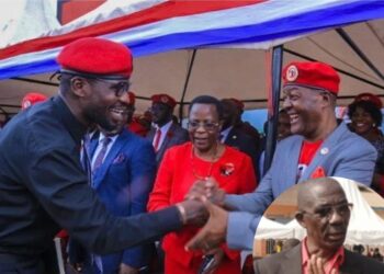 Bobi wine greeting Muyanja Ssenyonga at the party headquarters.