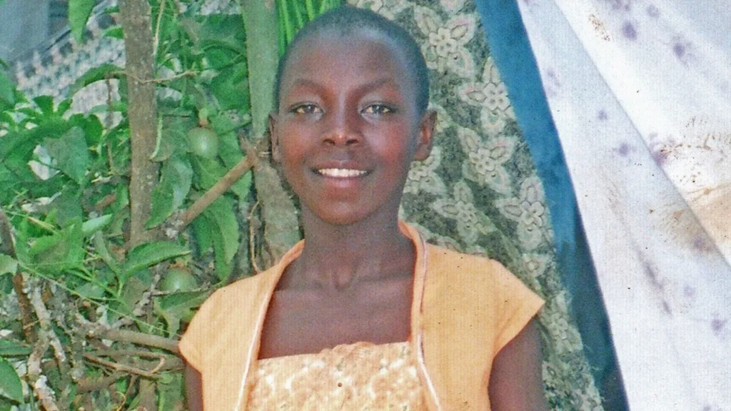 Monic grew up in rural Uganda with 10 siblings