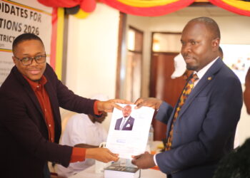 SSekikubo receiving nomination forms from Mukono Returning Officer