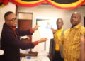 Returning officer after declaring Kibuule