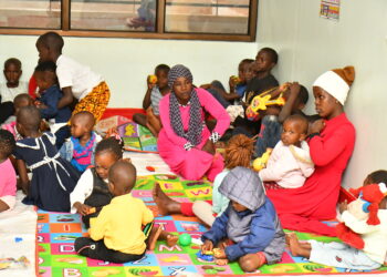 Some of the caretakers at the Lugazi central market day care centre.