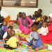 Some of the caretakers at the Lugazi central market day care centre.