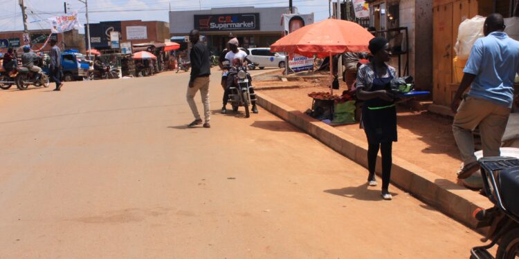 Nasuuti Junction was constructed without an access route for motorists to reach nearby shops, forcing vehicles and motorcycles to park along the road and worsen traffic congestion.