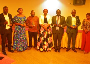 Winner pose for a photo with Justice Fatumah Nanziri, the Masaka Resident High Court Judge.
