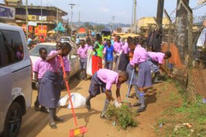 Pupils participate in a community clean-up drive in Masaka. Photos by Robert Nsubuga.