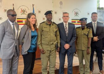 James V. Bloomer, Senior Regional Security Officer at the U.S. Embassy in Kampala, addresses journalists alongside Police Public Relations Officers during a briefing on visa fraud at the Uganda Media Centre.