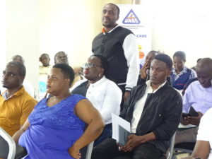 UNBS engaging supermarket owners on selling certified products. Credit UNBS