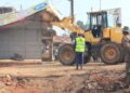 Authorities carry out an early morning demolition of roadside kiosks in Kikooza, Mukono Municipality, as part of an enforcement operation to clear illegal structures from road reserves.