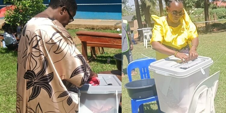 Nambooze and Dr Daisy Sarah Nabatanzi Ssonko during voting on election day in Mukono Municipality.