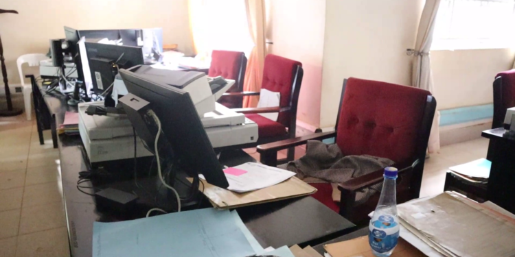 Empty seats at the Mukono Ministerial Zonal Office, highlighting absenteeism concerns among staff under investigation.