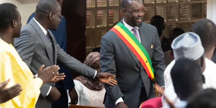 Ousmane Sonko, seen here wearing his parliamentary sash, originally backed Bassirou Diomaye Faye for president in 2024 after he was barred from running himself.