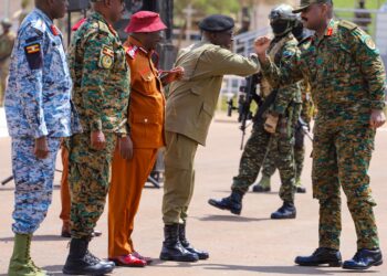 Gen Muhoozi Kainerugaba being welcomed at Kololo Ceremonial Grounds ahead of the inspection of swearing in parade rehearsals by senior security officials.