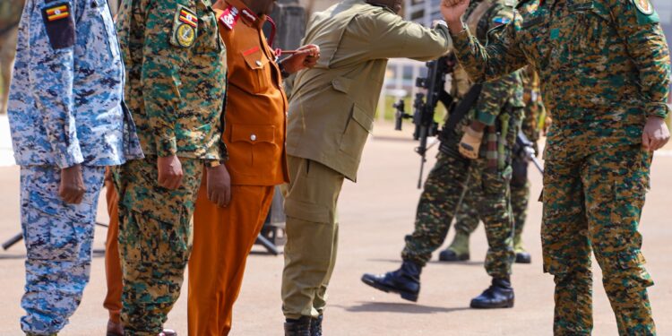 Gen Muhoozi Kainerugaba being welcomed at Kololo Ceremonial Grounds ahead of the inspection of swearing in parade rehearsals by senior security officials.
