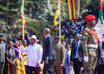 Yoweri Kaguta Museveni waves to supporters