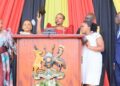 Sheilla Amaniyo takes oath as Mukono District Woman MP during the swearing-in ceremony of Uganda’s 12th Parliament.