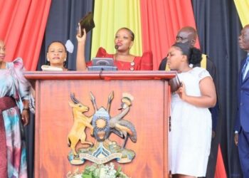Sheilla Amaniyo takes oath as Mukono District Woman MP during the swearing-in ceremony of Uganda’s 12th Parliament.
