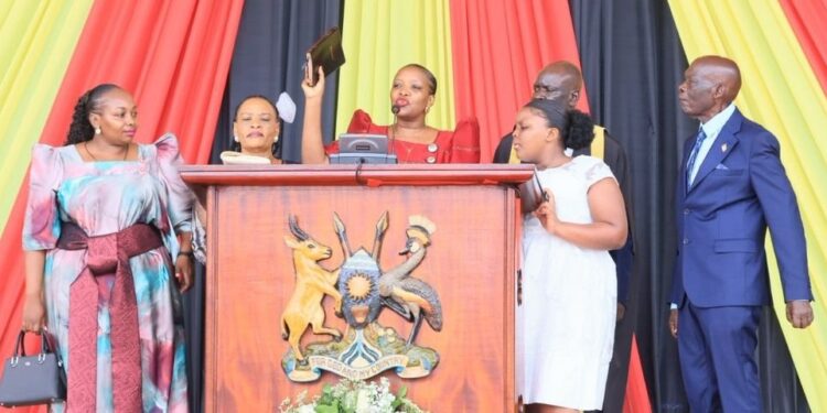 Sheilla Amaniyo takes oath as Mukono District Woman MP during the swearing-in ceremony of Uganda’s 12th Parliament.