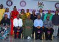 Lady Justice Mary Kisakye (seated centre, front row) poses for a group photo with newly elected UJO-SACCO executive committee members and judicial officers after the Annual General Meeting in Kampala on Saturday.